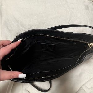 Black coach purse approximately 12inx15in with long over the shoulder strap
